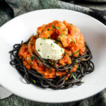 Spot Prawns in a spicy tomato sauce with mascarpone and nero di seppia (cuttlefish ink) pasta - Diversivore.com