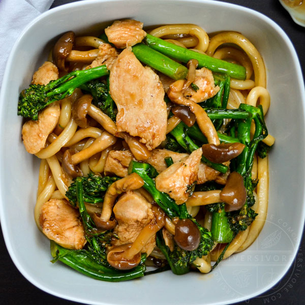 Stir-fried udon noodles with broccolini, chicken and shimeji mushrooms.