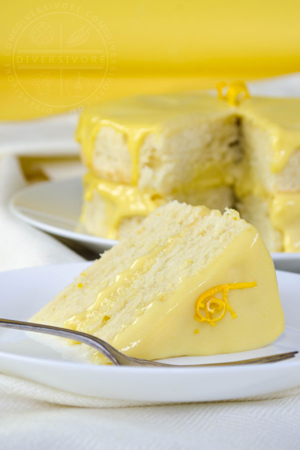 A slice of Lemon Whip Cake with Dairy-Free Lemon Curd served on a white plate