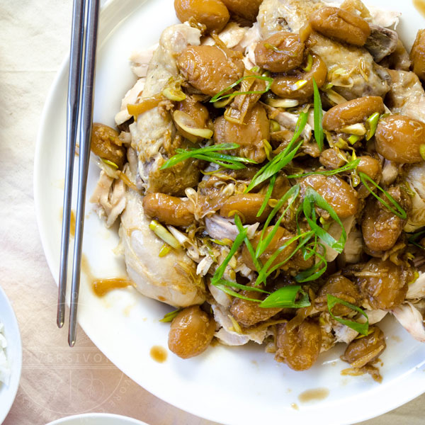 Steamed chicken served with wampee fruit