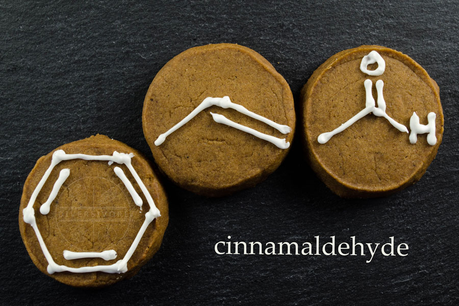 Chemical structure of cinnamaldehyde iced on gingerbread shortbread cookies